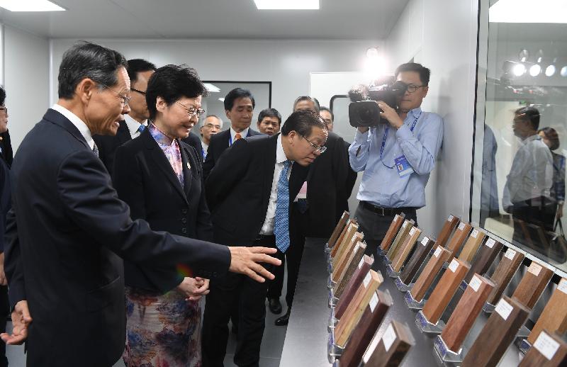 The Chief Executive, Mrs Carrie Lam, visited the Guangxi-Hong Kong (STC) Inspection, Test and Certification Centre in Nanning today (September 6). Photo shows Mrs Lam (second left) learning about a laboratory for testing wooden materials.