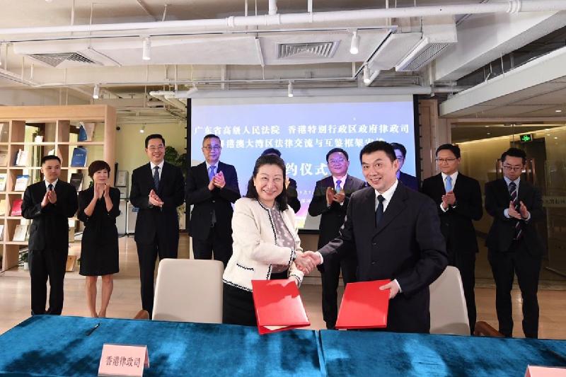 HKSAR and High People's Court of Guangdong Province signed a framework arrangement on exchange and mutual learning in legal aspects between Hong Kong and Guangdong today (September 7) to strengthen legal exchange and collaboration in the Greater Bay Area. Photo shows the Secretary for Justice, Ms Teresa Cheng, SC (left), and the President of the High People's Court of Guangdong Province, Mr Gong Jiali (right) shaking hands after signing the arrangement in Shenzhen.

