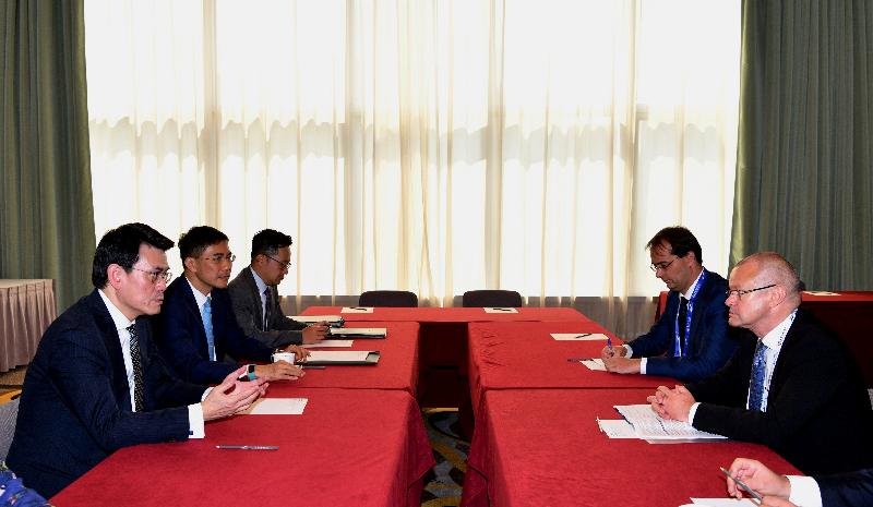 The Secretary for Commerce and Economic Development, Mr Edward Yau (first left), holds a bilateral meeting with the Minister of State for Financial Policy Affairs of the Ministry of Finance of Hungary, Mr Gábor Gion (first right), on the sidelines of the fourth Belt and Road Summit today (September 11). The Commissioner for Belt and Road, Mr Denis Yip (second left), also attended the meeting.