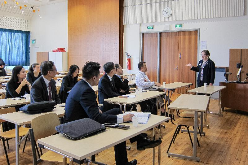 The delegation of the Legislative Council visited Töölön Upper Secondary School in Helsinki, Finland, yesterday (September 11, Helsinki time) and received a briefing by the Principal, Ms Pirkko Majakangas (first right), on the upper secondary education system of Finland. 