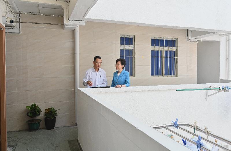 The Chief Executive, Mrs Carrie Lam (right), this afternoon (September 13) inspects the renovation work of an old building in Yau Ma Tei. Photo shows Mrs Lam, accompanied by the Director (Building Rehabilitation) of the Urban Renewal Authority, Mr Daniel Ho (left), inspecting the renovated facilities in the common area of the building.