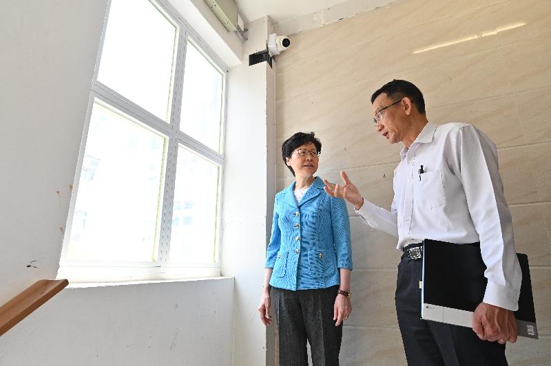 The Chief Executive, Mrs Carrie Lam (left), this afternoon (September 13) inspects the renovation work of an old building in Yau Ma Tei. Photo shows Mrs Lam, accompanied by the Director (Building Rehabilitation) of the Urban Renewal Authority, Mr Daniel Ho (right), inspecting the renovated facilities in the common area of the building.