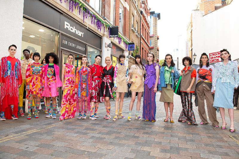 The Hong Kong Economic and Trade Office, London is supporting Hong Kong's promising fashion designers to showcase their work at London Fashion Week from September 12 to 16 (London Time). Photo shows models outside the Showcase wearing outfits from the four acclaimed designers: Loom Loop, 112 mountainyam, Yeung Chin and From Another Planets.
