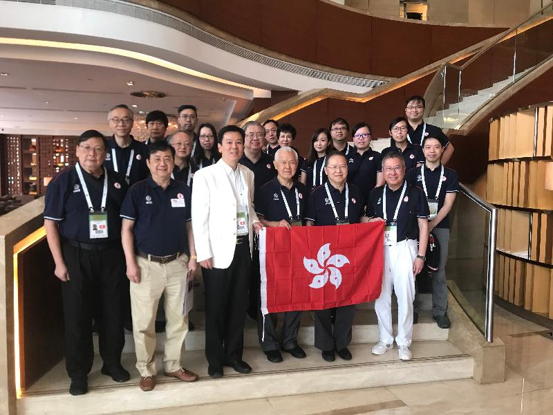 The Director of the Hong Kong Economic and Trade Office in Wuhan, Mr Vincent Fung (front row, third left) on September 14, is pictured with the Hong Kong Contract Bridge Teams (Open, Women and Seniors) delegation participating in the 44th World Bridge Team Championships in Wuhan.