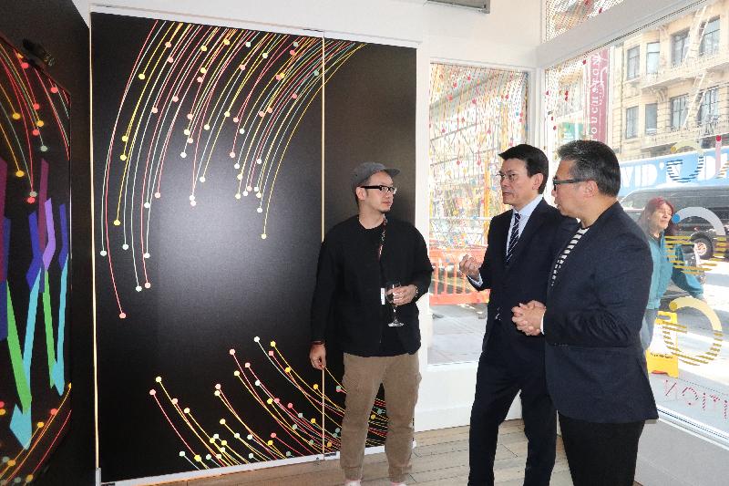 The Secretary for Commerce and Economic Development, Mr Edward Yau (centre), today (September 17, US West Coast time) toured the "Co-creating Hong Kong: a design+ exhibition" in San Francisco, the United States, and was briefed by a designer from Hong Kong about his work.
