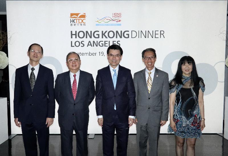The Secretary for Commerce and Economic Development, Mr Edward Yau, attends the "Think Asia, Think Hong Kong" Gala Dinner organised by the Hong Kong Trade Development Council (HKTDC) in Los Angeles, the United States (US), today (September 19, US West Coast time). Mr Yau (centre) is pictured with the Chairman of the HKTDC, Dr Peter Lam (second left), and the Executive Director of the HKTDC, Ms Margaret Fong (first right).