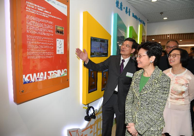 The Chief Executive, Mrs Carrie Lam (centre), accompanied by the Secretary for Food and Health, Professor Sophia Chan (right), tours around the Kwai Tsing District Health Centre to learn more about its facilities and services after officiating at the opening ceremony today (September 24). Photo shows Mrs Lam visiting the story lane in the centre.