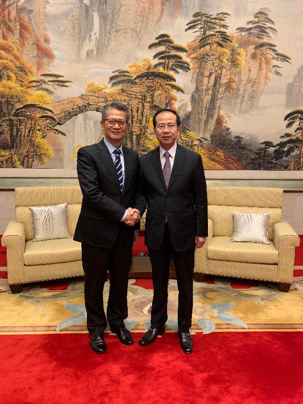 The Financial Secretary, Mr Paul Chan, today (September 26) visited Macao. Photo shows Mr Chan (left) shaking hands with the Director of the Liaison Office of the Central People's Government in the Macao Special Administrative Region, Mr Fu Ziying.