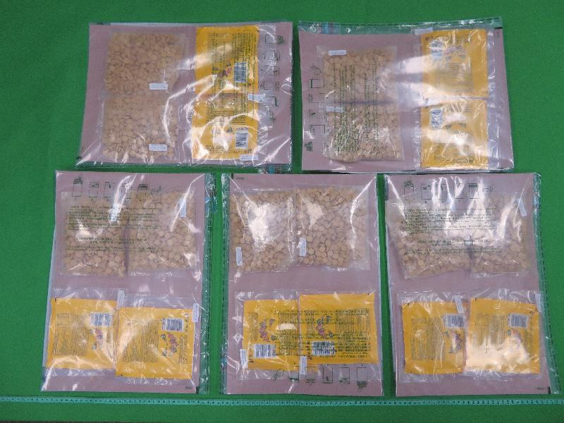 Hong Kong Customs yesterday (October 16) seized about 5 200 tablets of suspected ecstasy with an estimated market value of about $370,000 at Hong Kong International Airport.