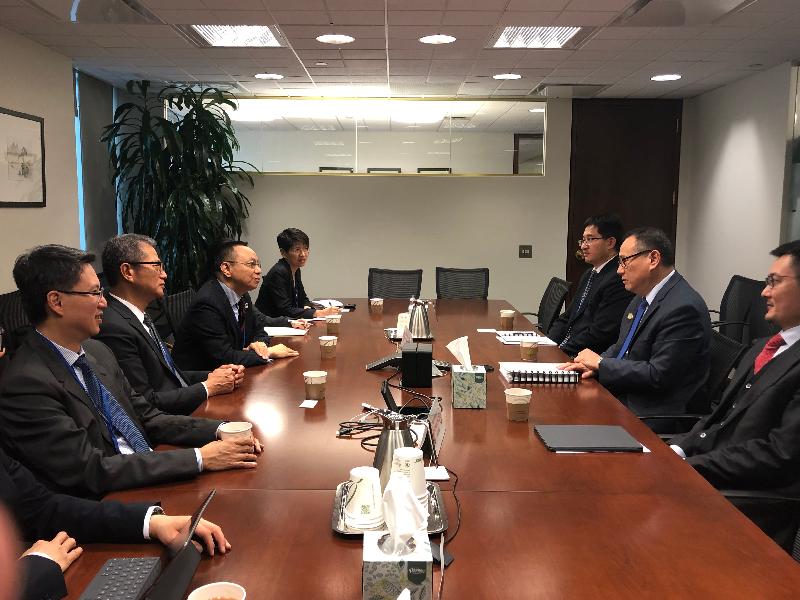 The Financial Secretary, Mr Paul Chan (second left), yesterday (October 18, Eastern Standard Time) had a meeting with the Managing Director of the World Bank and the World Bank Group Chief Administrative Officer, Mr Yang Shaolin (second right), in Washington, DC, the United States, to discuss about the latest development of Hong Kong and the Hong Kong Special Administrative Region Government’s work in maintaining financial stability. Also present were the Hong Kong Commissioner for Economic and Trade Affairs, USA, Mr Eddie Mak (first left) and Executive Director of the Hong Kong Monetary Authority, Mr Darryl Chan (third left).
