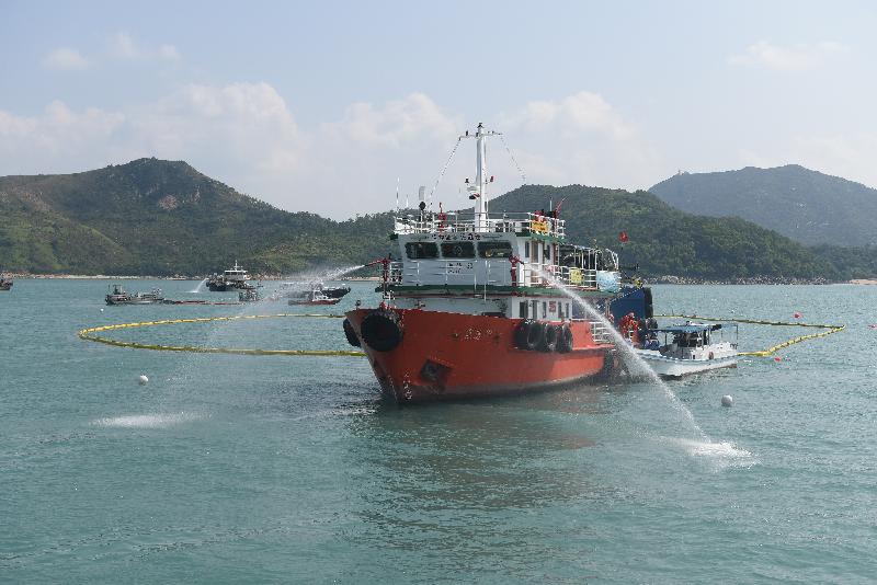 Two annual marine pollution response joint exercises, codenamed Oilex 2019 and Maritime Hazardous and Noxious Substances (HNS) 2019, were conducted by various government departments this morning (October 22) off the western coast of Lamma Island to test their marine pollution responses in the event of spillage of oil and HNS in Hong Kong waters. Photo shows a pollution control vessel simulating the spraying of oil dispersant with water.