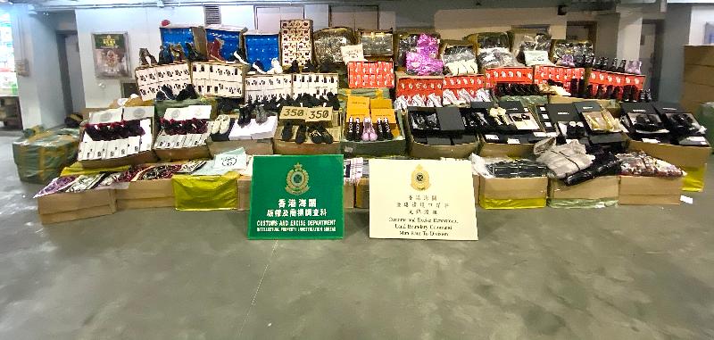 Hong Kong Customs seized about 55 000 items of suspected counterfeit and smuggled goods with an estimated market value of about $5.6 million at Man Kam To Control Point on October 26. This is the largest counterfeit goods smuggling case detected by Customs at land boundary control points in the past three years.