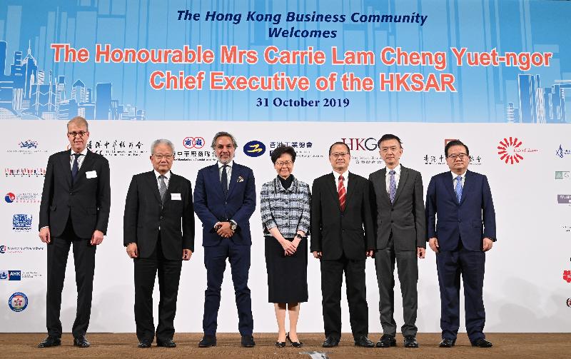 The Chief Executive, Mrs Carrie Lam, attended the Joint Business Community Luncheon at the Hong Kong Convention and Exhibition Centre today (October 31). Photo shows (from left) the Vice-Chairman of the Belgium-Luxembourg Chamber of Commerce in Hong Kong, Mr Philippe Latour; the President of the Chinese Manufacturers' Association of Hong Kong, Dr Dennis Ng; the Chairman of the Hong Kong General Chamber of Commerce, Dr Aron Harilela; Mrs Lam; the Chairman of the Chinese General Chamber of Commerce, Hong Kong, Dr Jonathan Choi; the Chairman of the Federation of Hong Kong Industries, Dr Daniel Yip; and the Chairman of the Hong Kong Chinese Enterprises Association, Mr Gao Yingxin, at the event.