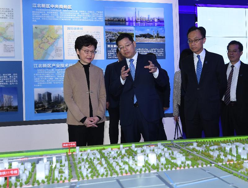 The Chief Executive, Mrs Carrie Lam, visited the Jiangbei New Area Planning Exhibition Hall in Nanjing today (November 3). Photo shows Mrs Lam (first left) being briefed on the development of the Jiangbei New Area. Looking on is the Secretary for Constitutional and Mainland Affairs, Mr Patrick Nip (third left).