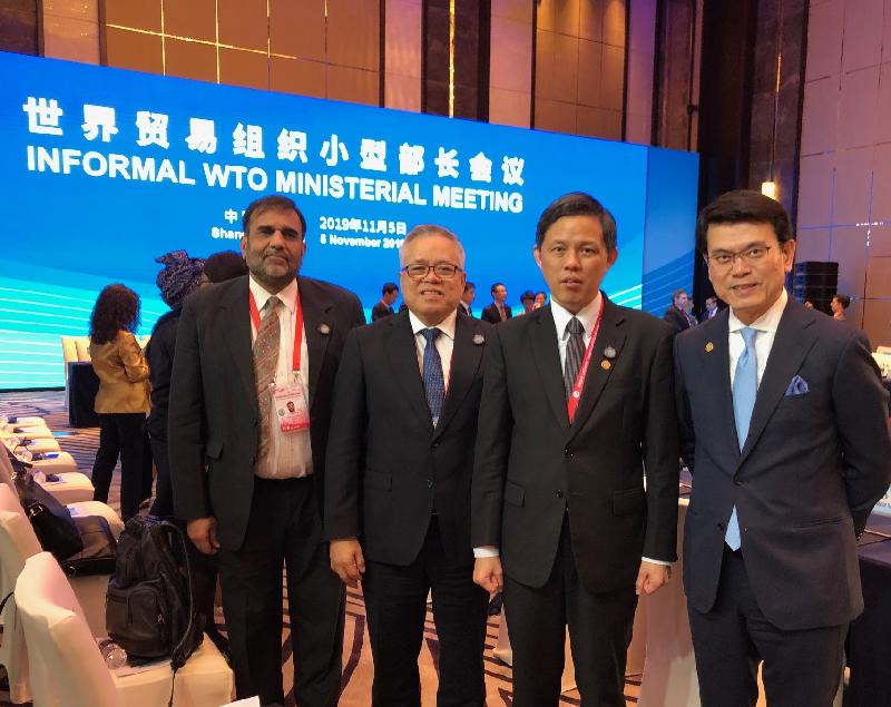 The Secretary for Commerce and Economic Development, Mr Edward Yau, attended the Informal World Trade Organization Ministerial Meeting in Shanghai this afternoon (November 5). Mr Yau (first right) is pictured with (from right) the Minister for Trade and Industry of Singapore, Mr Chan Chun-sing; the Secretary of Trade and Industry of the Philippines, Mr Ramon Lopez; and the Commerce Secretary of India, Mr Anup Wadhawan.


