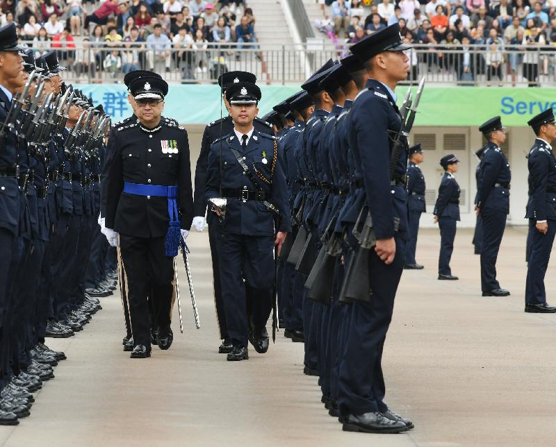The Commissioner of Police, Mr Lo Wai-chung, reviews the passing-out parade at the Hong Kong Police College today (November 16).