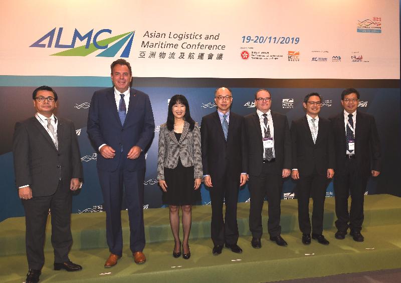 The Chairman of the Hong Kong Maritime and Port Board and Secretary for Transport and Housing, Mr Frank Chan Fan (centre), is pictured with the Executive Director of the Hong Kong Trade Development Council, Ms Margaret Fong (third left); the Senior Economist of the Economic Research and Statistics Division of the World Trade Organization, Mr Coleman Nee (third right); the Senior Vice President and Head of Asia Pacific Region of Maersk, Mr Robbert van Trooijen (second left); the Partner and Chief Executive Officer of HOPU Investments, Mr Lau Teck Sien (second right); the Senior Executive Officer of Yamato Holdings Co Ltd, Mr Katsuhiko Umetsu (first left); and the Managing Director of Li & Fung Development (China) Limited and Fung Business Intelligence, Mr Chang Ka-mun (first right), at the Asian Logistics and Maritime Conference today (November 19).