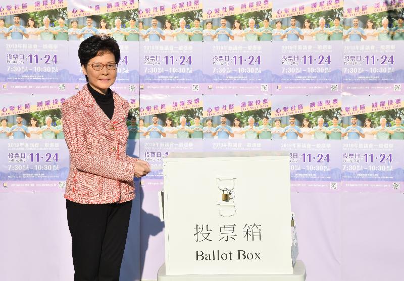 The Chief Executive, Mrs Carrie Lam, casts her vote in the 2019 District Council Ordinary Election at Raimondi College in Central and Western District this morning (November 24).