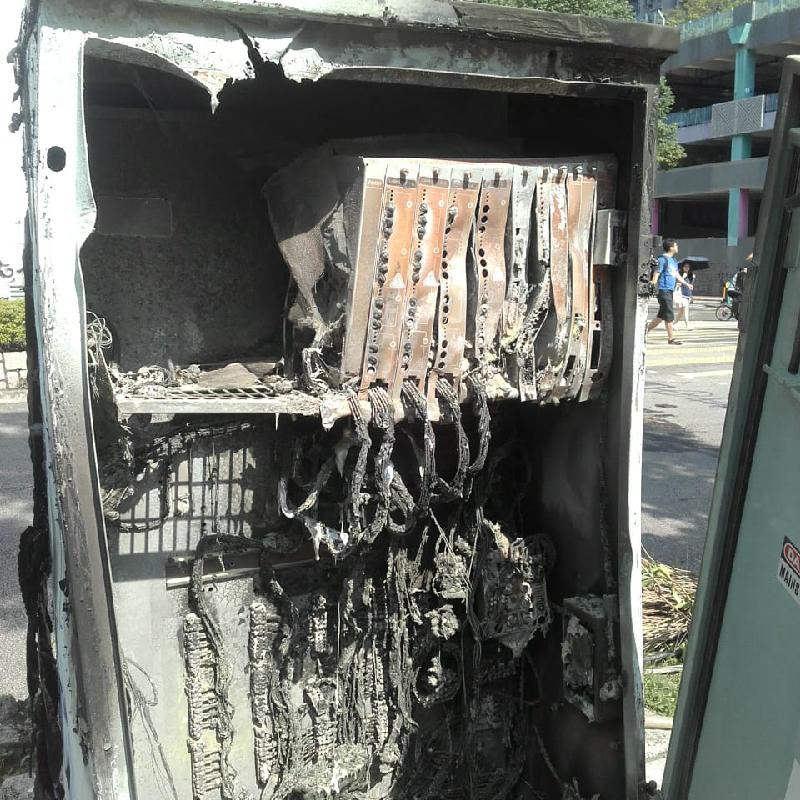 The Transport Department said today (November 28) that about 730 sets of traffic lights in various districts have been damaged to varying degrees since June. After months of continual repair works, about 650 sets have resumed normal operation. Photo shows a traffic controller damaged by fire.