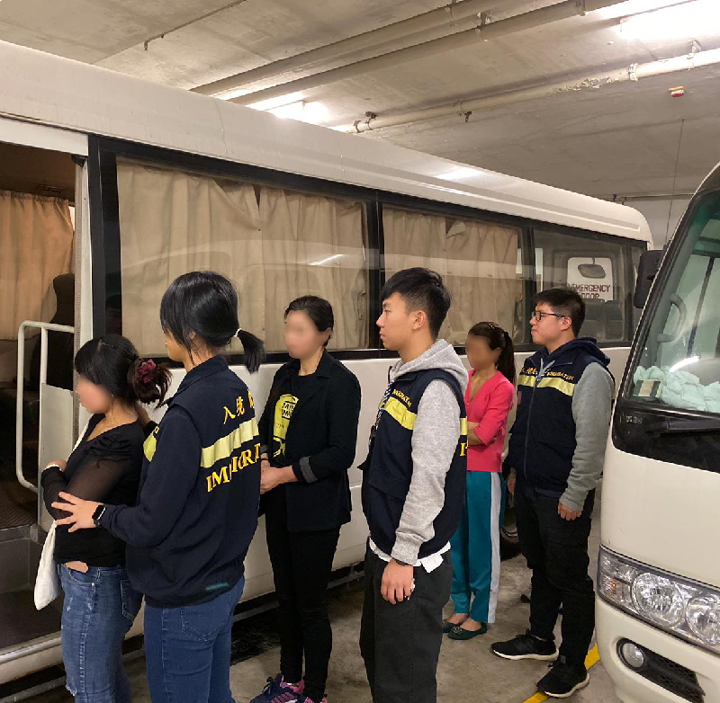The Immigration Department mounted an anti-illegal worker operation codenamed "Breakthrough" from December 1 to 3. Photo shows the suspected illegal workers arrested during the operation.
