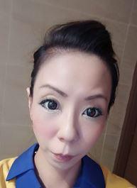 Suen Man-hung, aged 36, is about 1.45 metres tall, 45 kilograms in weight and of thin build. She has a long face with yellow complexion and long straight black hair.