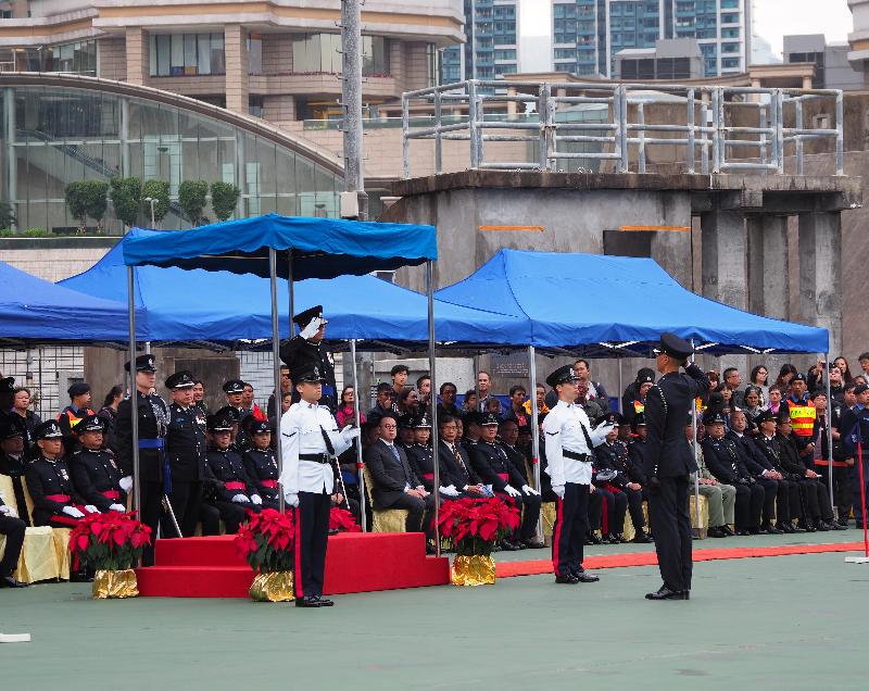 The Civil Aid Service held the 80th Recruits Passing-out Parade at its headquarters today (December 15). Photo shows the Commissioner of Police, Mr Tang Ping-keung, taking the salute from the parade.