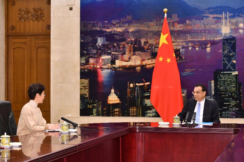The Chief Executive, Mrs Carrie Lam (left), briefed Premier Li Keqiang in Beijing this morning (December 16) on the latest economic, social and political situation in Hong Kong.
