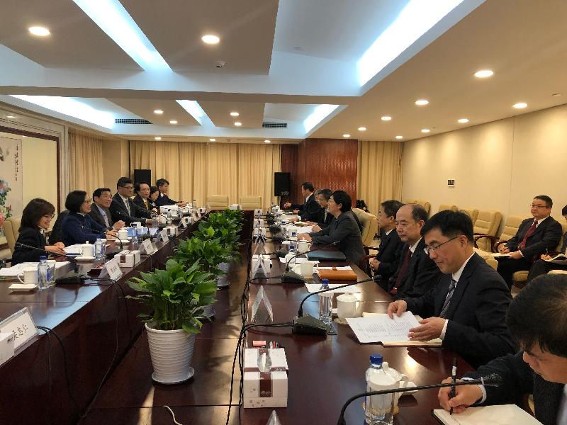 The Secretary for Food and Health, Professor Sophia Chan (second left), today (December 23) embarked on the first day of her visit in Beijing, and met with the Director of the National Medical Products Administration, Ms Jiao Hong (fifth right). Looking on are the Permanent Secretary for Food and Health (Health), Ms Elizabeth Tse (first left); the Chairman of the Hospital Authority (HA), Mr Henry Fan (third left); the Chief Executive of the HA, Dr Tony Ko (fourth left); and the Project Director of the Chinese Medicine Hospital Project Office of the Food and Health Bureau, Dr Cheung Wai-lun (fifth left).
