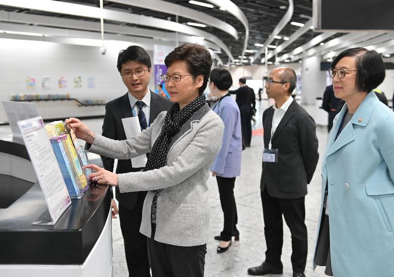 The Chief Executive, Mrs Carrie Lam, today (January 3) visited the West Kowloon Station of the Guangzhou-Shenzhen-Hong Kong Express Rail Link to inspect the prevention measures adopted at the boundary control point in response to the cluster of pneumonia cases detected in Wuhan, Hubei Province. Photo shows Mrs Lam (second left), accompanied by the Secretary for Food and Health, Professor Sophia Chan (first right), touring the health information counter.