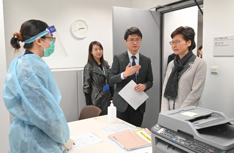The Chief Executive, Mrs Carrie Lam, today (January 3) visited the West Kowloon Station of the Guangzhou-Shenzhen-Hong Kong Express Rail Link to inspect the prevention measures adopted at the boundary control point in response to the cluster of pneumonia cases detected in Wuhan, Hubei Province. Photo shows Mrs Lam (first right) being briefed by the Chief Port Health Officer of the Centre for Health Protection of the Department of Health, Dr Leung Yiu-hong (second right), on the operation of the station's health screening room.
