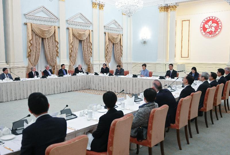 The Chief Executive, Mrs Carrie Lam (eighth left), meets members of the University Grants Committee at Government House today (January 10) to exchange views on the development of higher education in Hong Kong.