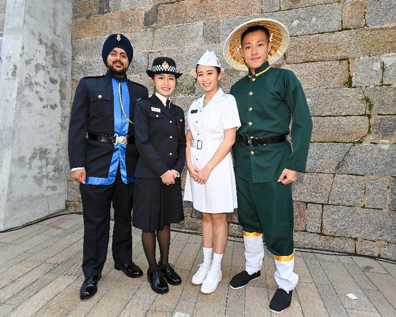 To celebrate the 100th anniversary of the establishment of the Correctional Services Department (CSD), a "Kick-off Ceremony of Celebration Events cum Carnival for 100th Anniversary of CSD" was held at Tai Kwun, Central today (January 12). Photo shows correctional officers wearing old and current uniforms.
