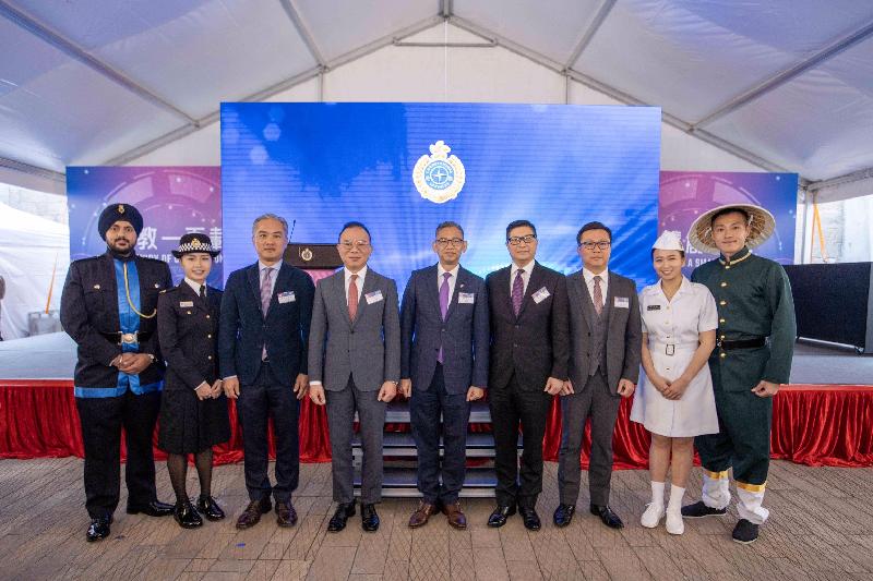 To celebrate the 100th anniversary of the establishment of the Correctional Services Department (CSD), a "Kick-off Ceremony of Celebration Events cum Carnival for 100th Anniversary of CSD" was held at Tai Kwun, Central today (January 12). Photo shows the Director of Fire Services, Mr Li Kin-yat (third left); the Director of Immigration, Mr Erick Tsang (fourth left); the Commissioner of Correctional Services, Mr Woo Ying-ming (centre); the Commissioner of Police, Mr Tang Ping-keung (fourth right); and the Commissioner of Customs and Excise, Mr Hermes Tang Yi-hoi (third right), posing with correctional officers.