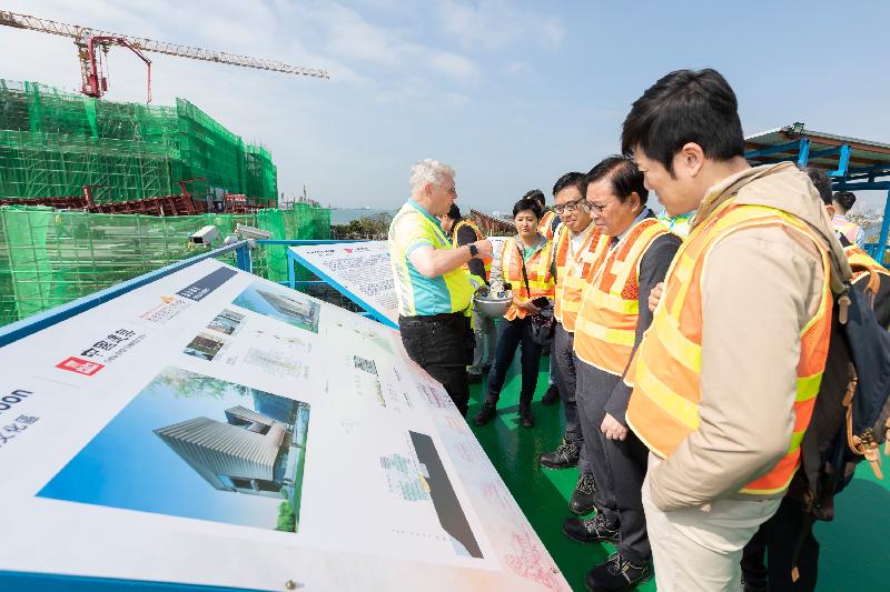 Legislative Council Members are briefed by the Chief Executive Officer of the West Kowloon Cultural District Authority, Mr Duncan Pescod (first left), on the latest developments of the Hong Kong Palace Museum at its construction site today (January 13). 