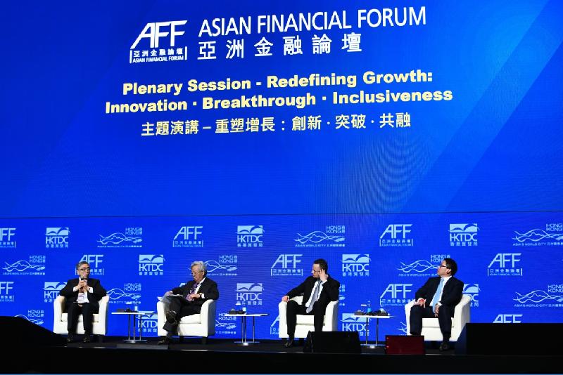 The Secretary for Financial Services and the Treasury, Mr James Lau, attended the plenary session on "Redefining Growth: Innovation ∙ Breakthrough ∙ Inclusiveness" at the 13th Asian Financial Forum this morning (January 13). Photo shows Mr Lau (first left) moderating the plenary session at the Forum and exchanging views with the President and Chairman of the Asian Infrastructure Investment Bank, Mr Jin Liqun (second left); the Minister of Foreign Affairs and Trade, Hungary, Mr Péter Szijjártó (second right); and the Minister of Finance, Thailand, Dr Uttama Savanayana (first right).