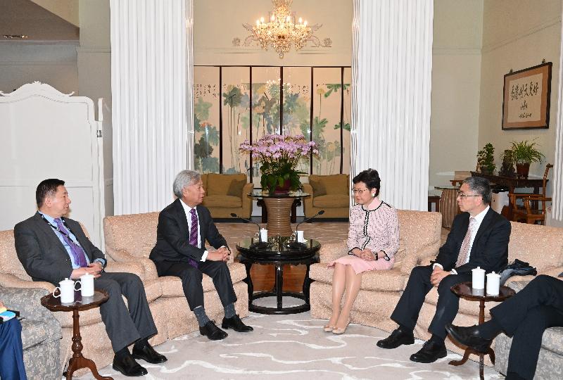 The Chief Executive, Mrs Carrie Lam (second right), accompanied by the Secretary for Financial Services and the Treasury, Mr James Lau (first right), meets the President and Chairman of the Asian Infrastructure Investment Bank, Mr Jin Liqun (second left), at Government House this afternoon (January 13).