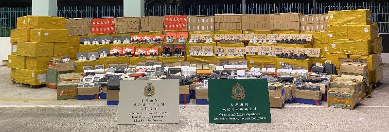 Hong Kong Customs seized about 20 000 items of suspected counterfeit goods with an estimated market value of about $2.3 million at Man Kam To Control Point on January 14.