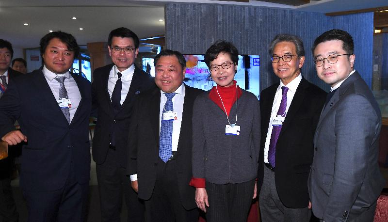 The Chief Executive, Mrs Carrie Lam, attended the World Economic Forum Annual Meeting in Davos, Switzerland, today (January 21, Davos time). Photo shows Mrs Lam (third right); the Secretary for Commerce and Economic Development, Mr Edward Yau (second left); the Chairman of the Airport Authority Hong Kong, Mr Jack So (second right); the Chairman and the Chief Executive Officer of the Far East Consortium International, Mr David Chiu (third left) and other guests in a group picture before attending a discussion session on expanding Asia's technology leadership.
