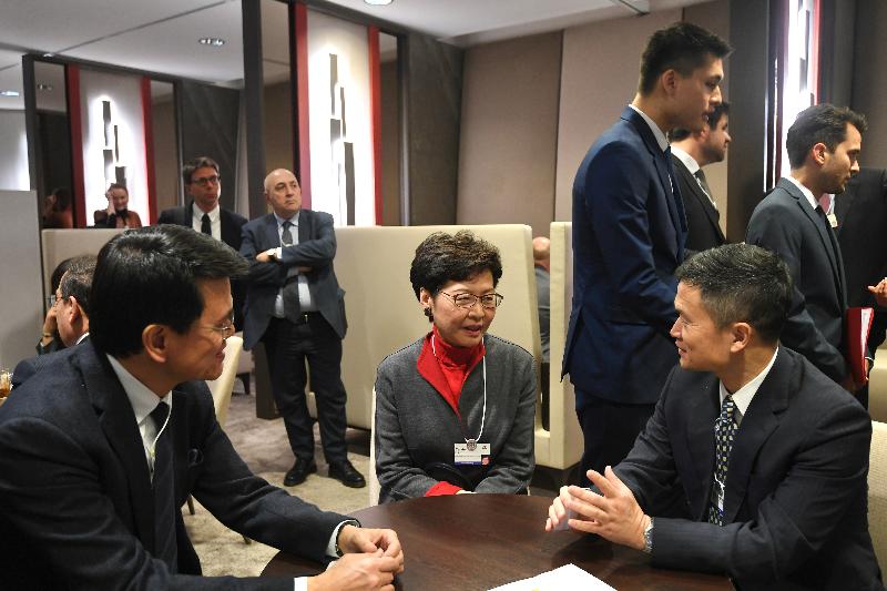 The Chief Executive, Mrs Carrie Lam, attended the World Economic Forum Annual Meeting in Davos, Switzerland, today (January 21, Davos time). Photo shows Mrs Lam (centre) meeting with Vice Chairman of the China Securities Regulatory Commission Mr Fang Xinghai (right). The Secretary for Commerce and Economic Development, Mr Edward Yau (left); also attended.

