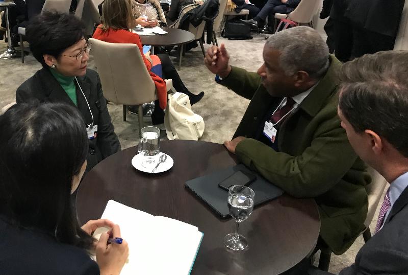 The Chief Executive, Mrs Carrie Lam, continued to attend the World Economic Forum Annual Meeting in Davos, Switzerland, today (January 22, Davos time). Photo shows Mrs Lam (second left) meeting with the Chairman of Vista Equity Partners, Mr Robert Smith (second right).