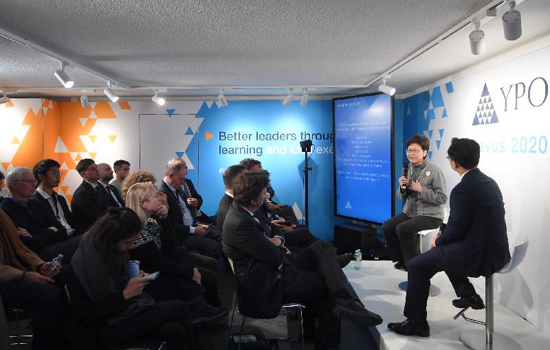 The Chief Executive, Mrs Carrie Lam, continued to attend the World Economic Forum Annual Meeting in Davos, Switzerland, today (January 23, Davos time). Photo shows Mrs Lam (left) speaking at a seminar organised by the Young Presidents' Organization.