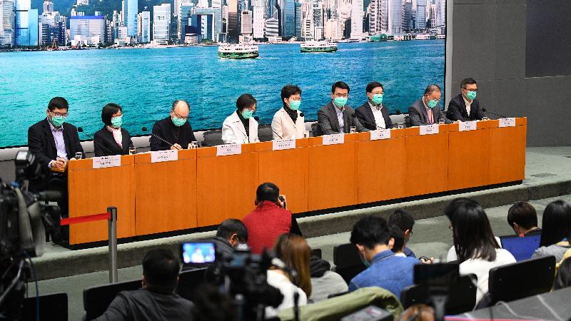 The Chief Executive, Mrs Carrie Lam (fifth left), holds a press conference on measures of fighting disease with the Secretary for Commerce and Economic Development, Mr Edward Yau (fourth right); the Secretary for Food and Health, Professor Sophia Chan(fourth left); the Secretary for Security, Mr John Lee (third right); the Secretary for Transport and Housing, Mr Frank Chan Fan (third left); the Director of Immigration, Mr Erick Tsang (second right); the Director of Health, Dr Constance Chan (second left); the Commissioner of Customs and Excise, Mr Hermes Tsang (first right); and the Chief Executive of the Hospital Authority, Dr Tony Ko (first left), at the Central Government Offices, Tamar, today (January 28). 