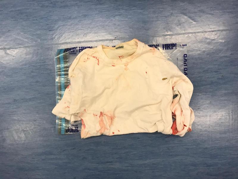 The newborn baby girl with umbilical cord was wrapped in a white cloth inside a nylon plastic bag.
