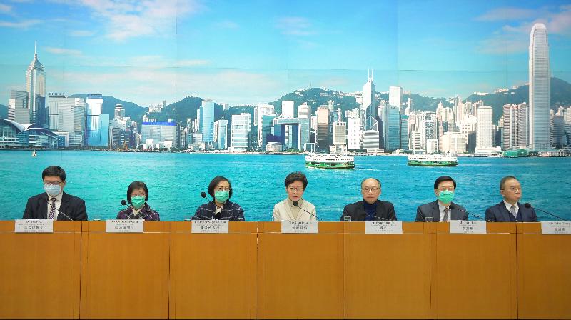 The Chief Executive, Mrs Carrie Lam (fourth left), holds a press conference on measures to fight disease with the Secretary for Security, Mr John Lee (second right); the Secretary for Transport and Housing, Mr Frank Chan Fan (third right); the Secretary for Food and Health, Professor Sophia Chan (third left); the Director of Immigration, Mr Tsang Kwok-wai (first right); the Director of Health, Dr Constance Chan (second left); and the Chief Executive of the Hospital Authority, Dr Tony Ko (first left), at the Central Government Offices, Tamar, today (February 3).