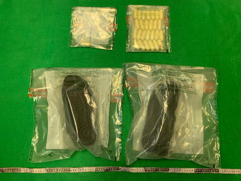 Hong Kong Customs detected three cases of drug trafficking by passengers yesterday (February 8) and today (February 9) at Hong Kong International Airport. About six kilograms of suspected methamphetamine and about four kilograms of suspected cocaine with an estimated market value of about $8.9 million were seized in total. Photo shows some of the suspected cocaine seized.