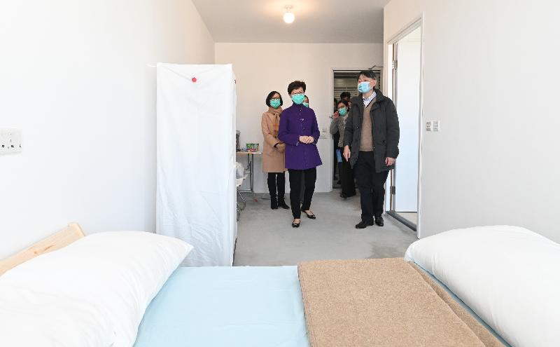 The Chief Executive, Mrs Carrie Lam (second left), today (February 19) inspected Chun Yeung Estate in Fo Tan, which will be used as a quarantine centre, to learn about the preparation work. Looking on is the Secretary for Food and Health, Professor Sophia Chan (first left).
