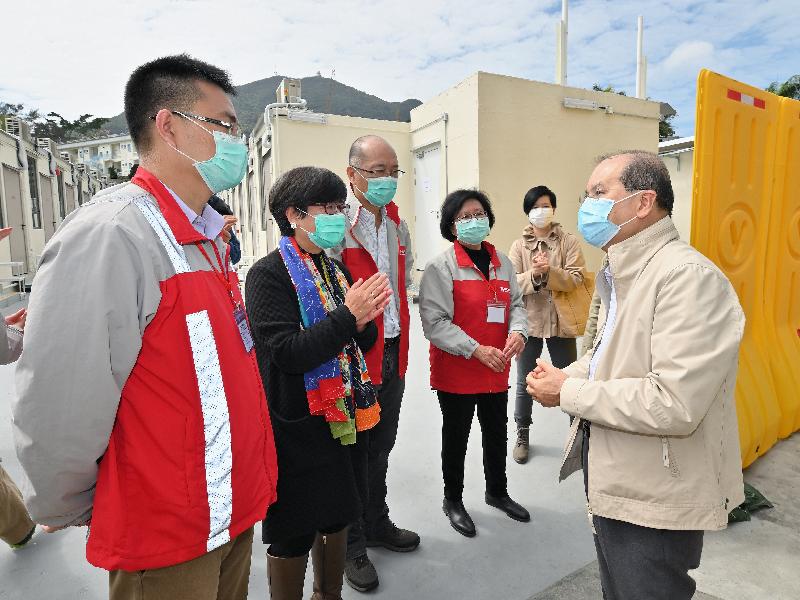 The Chief Secretary for Administration and Chairman of the Anti-epidemic Fund Steering Committee, Mr Matthew Cheung Kin-chung, today (February 29) visited Lei Yue Mun Park and Holiday Village to inspect the newly developed temporary quarantine facilities that will soon commence operation. Photo shows Mr Cheung (first right) learning about the preparatory work from the Director of Architectural Services, Mrs Sylvia Lam (second left).