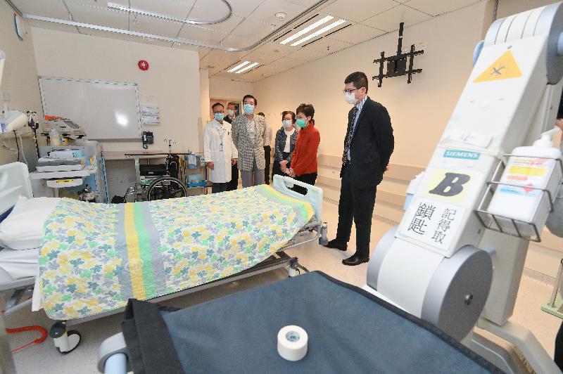 The Chief Executive, Mrs Carrie Lam (second right), accompanied by the Secretary for Food and Health, Professor Sophia Chan (third right), the Chairman, Mr Henry Fan (fourth right) and the Chief Executive Officer of the Hospital Authority (HA), Dr Tony Ko (first right) visited the North Lantau Hospital this afternoon (March 19) to learn about the preparation work of the HA to set up a test centre there.