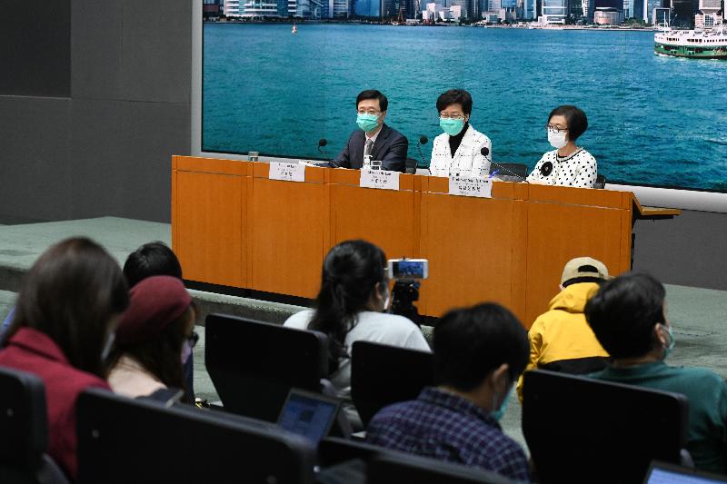 The Chief Executive, Mrs Carrie Lam (centre), holds a press conference on measures to fight the epidemic with the Secretary for Security, Mr John Lee (left), and the Secretary for Food and Health, Professor Sophia Chan (right), at the Central Government Offices, Tamar, today (March 23).