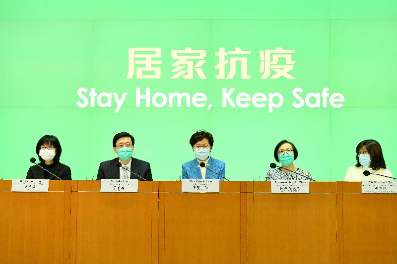 The Chief Executive, Mrs Carrie Lam (centre), holds a press conference on measures to fight the epidemic with the Secretary for Security, Mr John Lee (second left); the Secretary for Food and Health, Professor Sophia Chan (second right); the Permanent Secretary for Food and Health (Health), Ms Elizabeth Tse (first right); and the Director of Food and Environmental Hygiene, Miss Vivian Lau (first left), at the Central Government Offices, Tamar, today (March 27).
